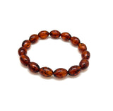 amber beads bracelet on white background