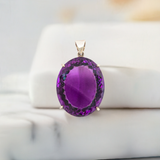 gorgeous 2-3 carat sized amethyst stone pendant in silver setting