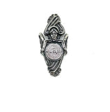 Silver pendant with intricate angel holding a labyrinth design on a white background