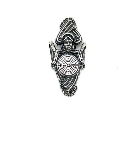 Silver pendant with intricate angel holding a labyrinth design on a white background