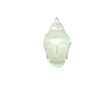 Crystal Buddha head sculpture on a white background