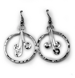 A pair of silver earrings with a leaf design, crafted from sterling silver.