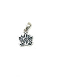 Silver lotus flower pendant on a white background