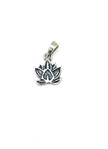 Silver lotus flower pendant on a white background