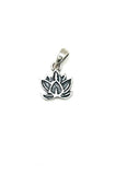 Silver lotus flower pendant on a white background