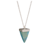 A turquoise pyramid-shaped stone pendant on a silver necklace chain.